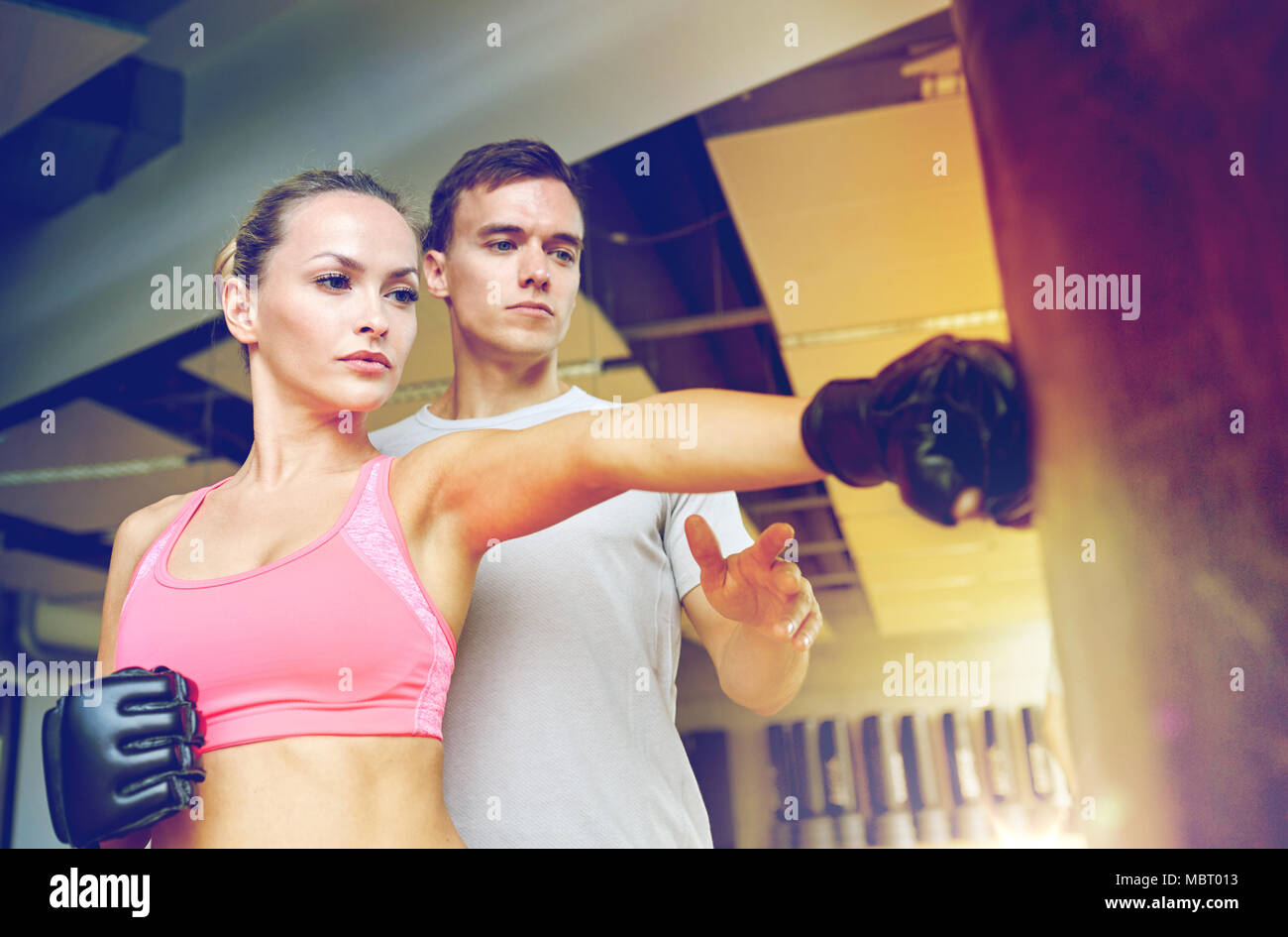 woman with personal trainer boxing in gym Stock Photo Alamy