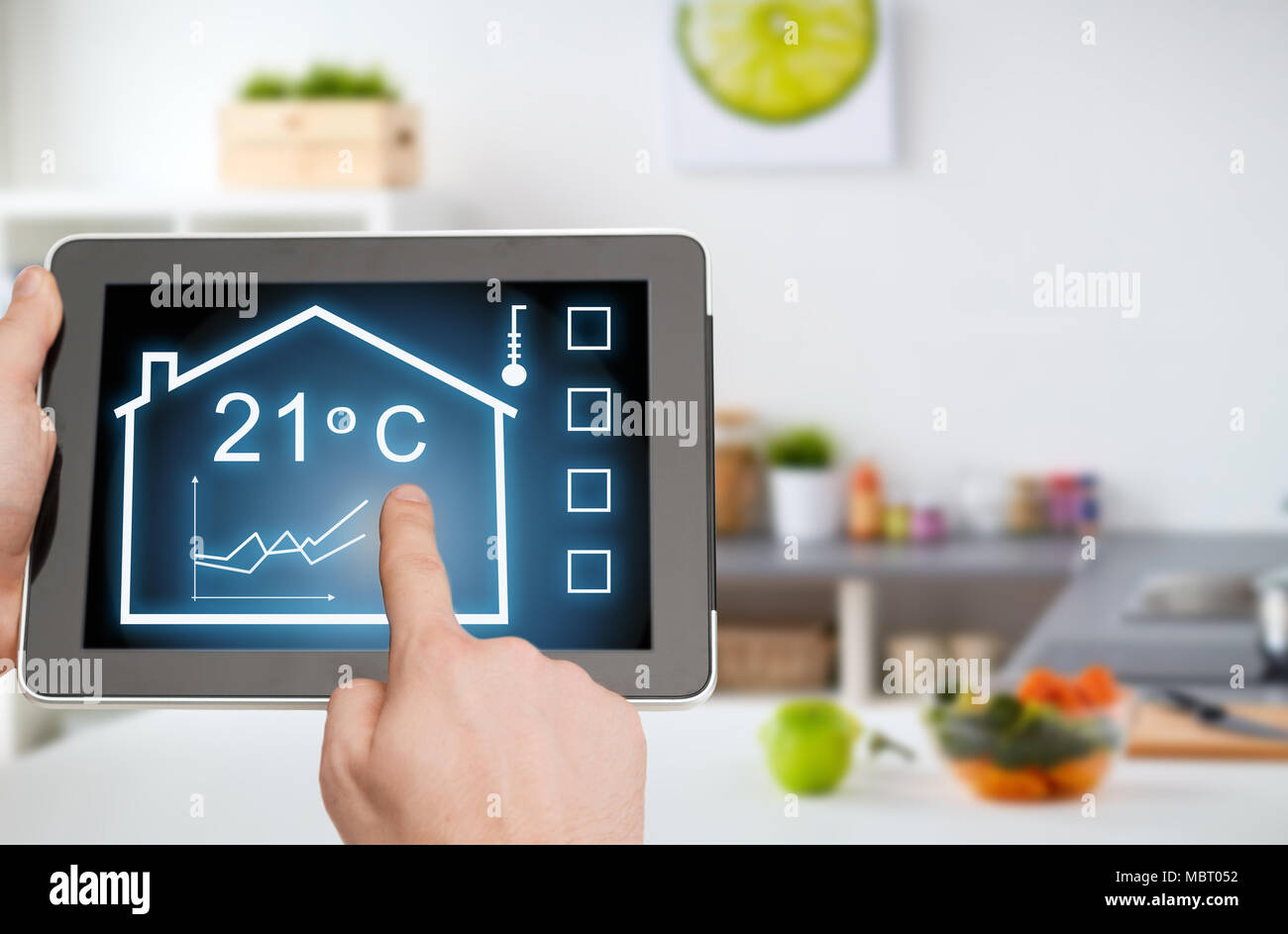 tablet pc with smart home settings on screen Stock Photo