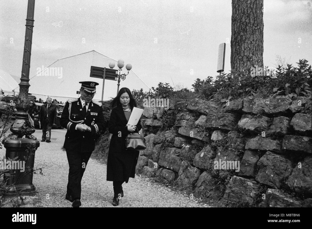 Young military general and his asian wife joined the Aviation forces Frecce Tricolori 93th Anniversary. Piazzale Michelangelo, Florence. Italy Stock Photo