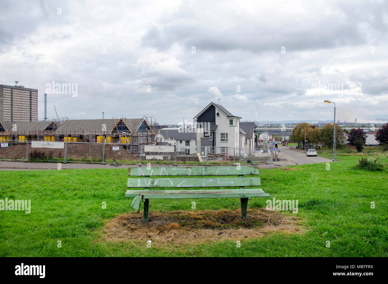 GLASGOW, SCOTLAND - OCTOBER 11TH 2016: A green bench with the misspelling of Nazi in the Prospecthill Circus in Toryglen. Stock Photo