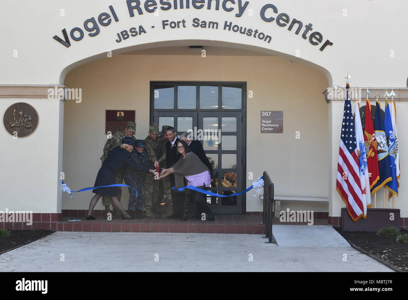 Military, community and family members cut the ribbon to officially open the Vogel Resiliency Center, Friday, January 5. Pictured L-r are Air Force Brig. Gen. Heather Pringle, Army Brig. Gen. Jeffrey Johnson, Rear Admiral Rebecca McCormick-Boyle, Army Lt. Gen. Jeffrey S. Buchanan, Army Lt. Gen. Nadja West, San Antonio Mayor Ron Nirenberg, Mrs. Sue Orosz, and Acting Asst. of the Army for Manpower and Reserve Affairs Raymond Horoho. The Vogel Resiliency Center brings together eight entities of resiliency services to one location. This facility is unique to Fort Sam Houston and unique in the Army Stock Photo