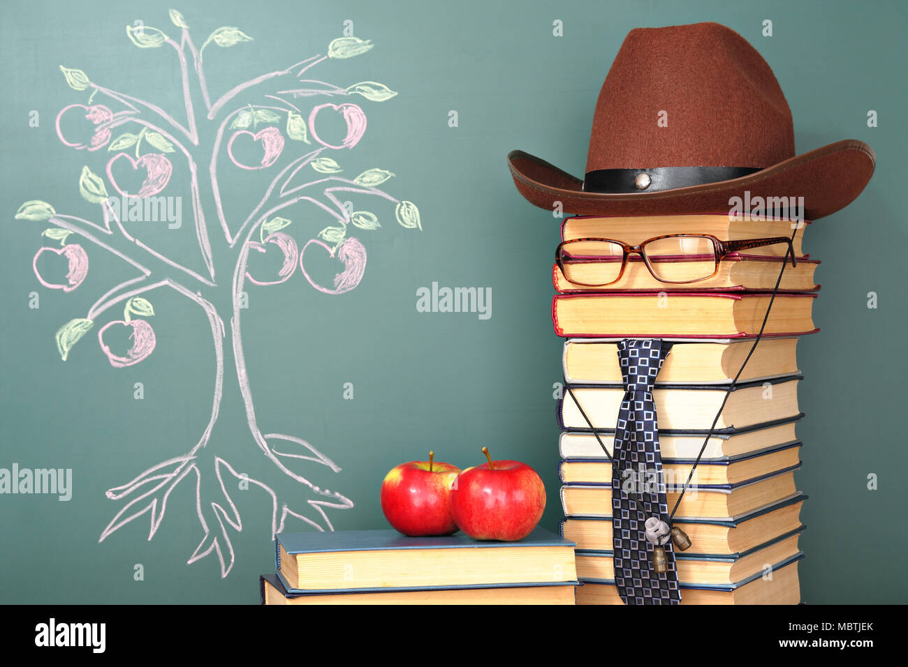 Tree of knowledge education concept with unusual teacher Stock Photo