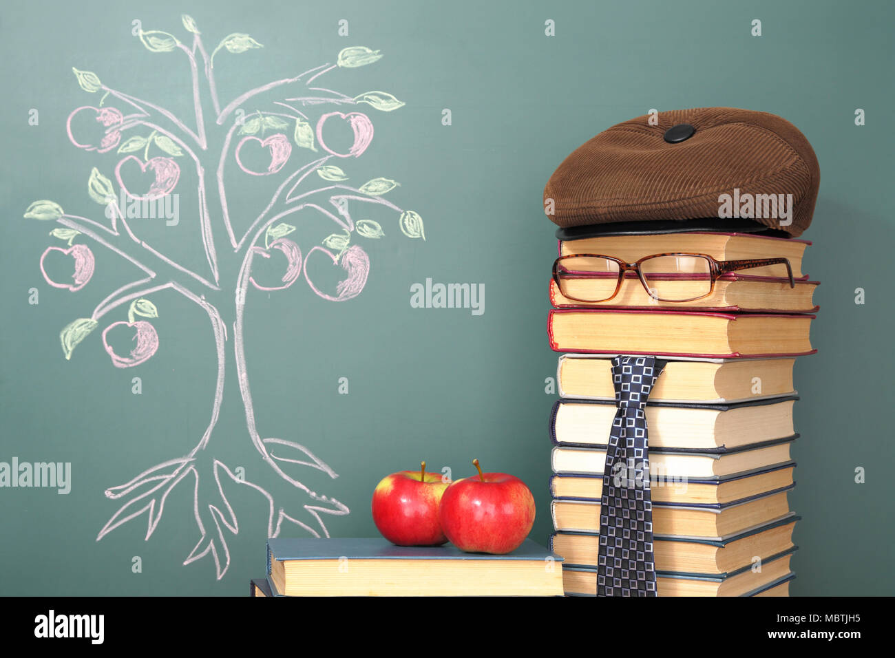 Tree of knowledge education concept with unusual teacher Stock Photo