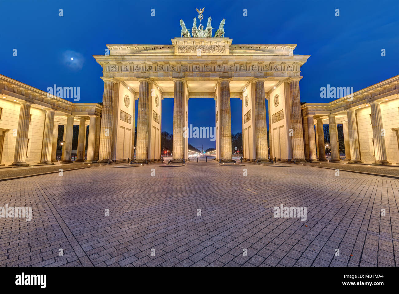 The famous illuminated Brandenburg Gate in Berlin, Germany, at night Stock Photo