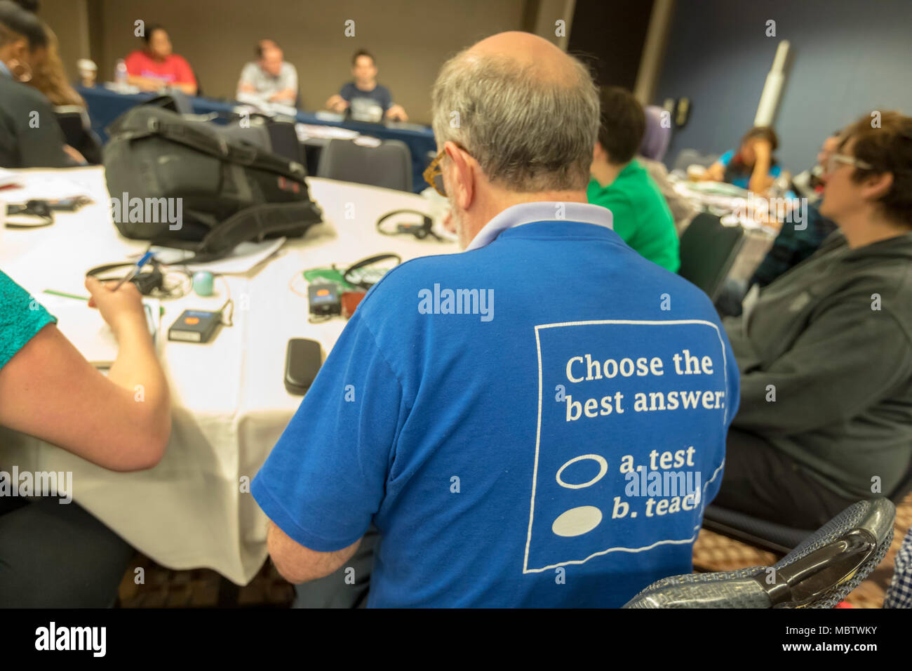 Chicago, Illinois - A teacher wears a t-shirt favoring teaching over testing. He was one of three thousand rank and file union activists from across t Stock Photo