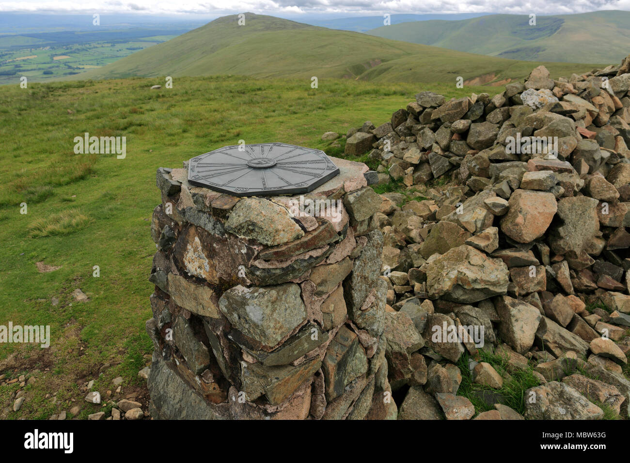 Summit cairn on High Pike fell, Caldbeck fells, Lake District National Park, Cumbria, England, UK High Pike Fell is one of the 214 Wainwright Fells. Stock Photo