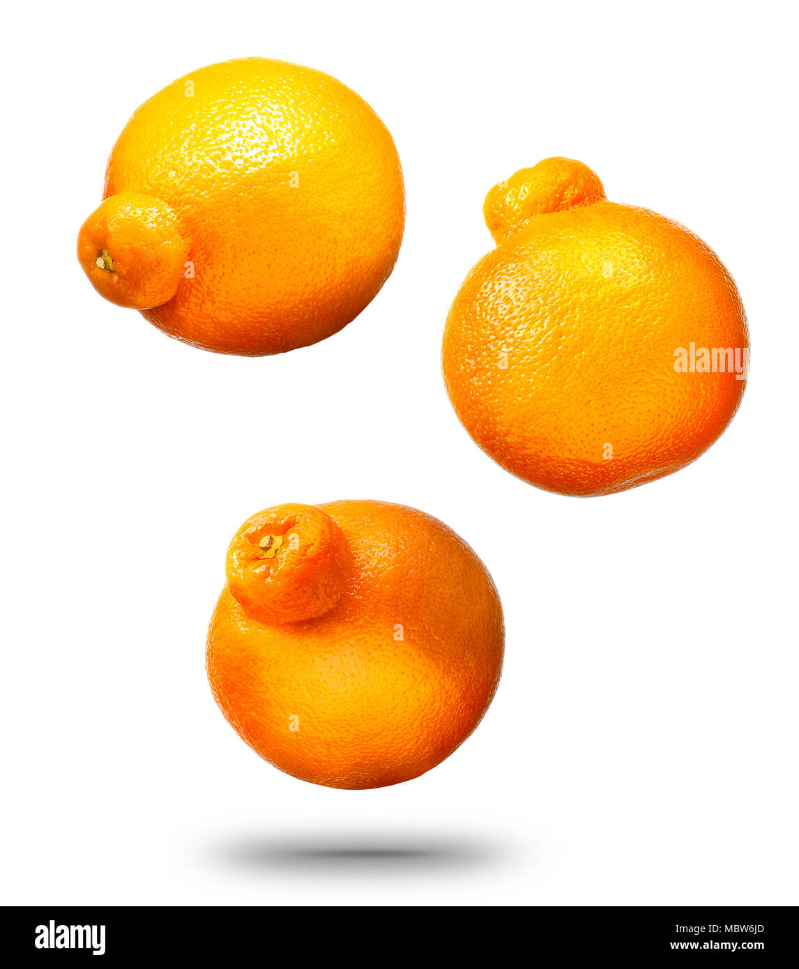 Falling mandarins or tangerines citrus fruit Stock Photo