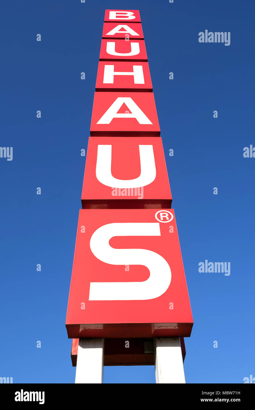 Bauhaus sign against blue sky. Bauhaus is a Swiss-headquartered retail chain offering products for home improvement, gardening and workshop. Stock Photo