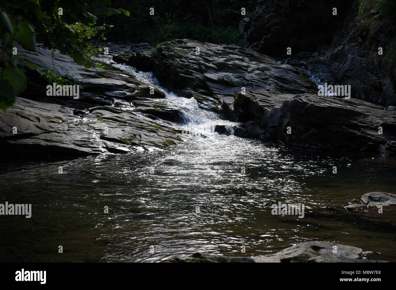 Mountain Rocks Strream Mountain stream flowing on rocks at deep forest Stock Photo - Alamy