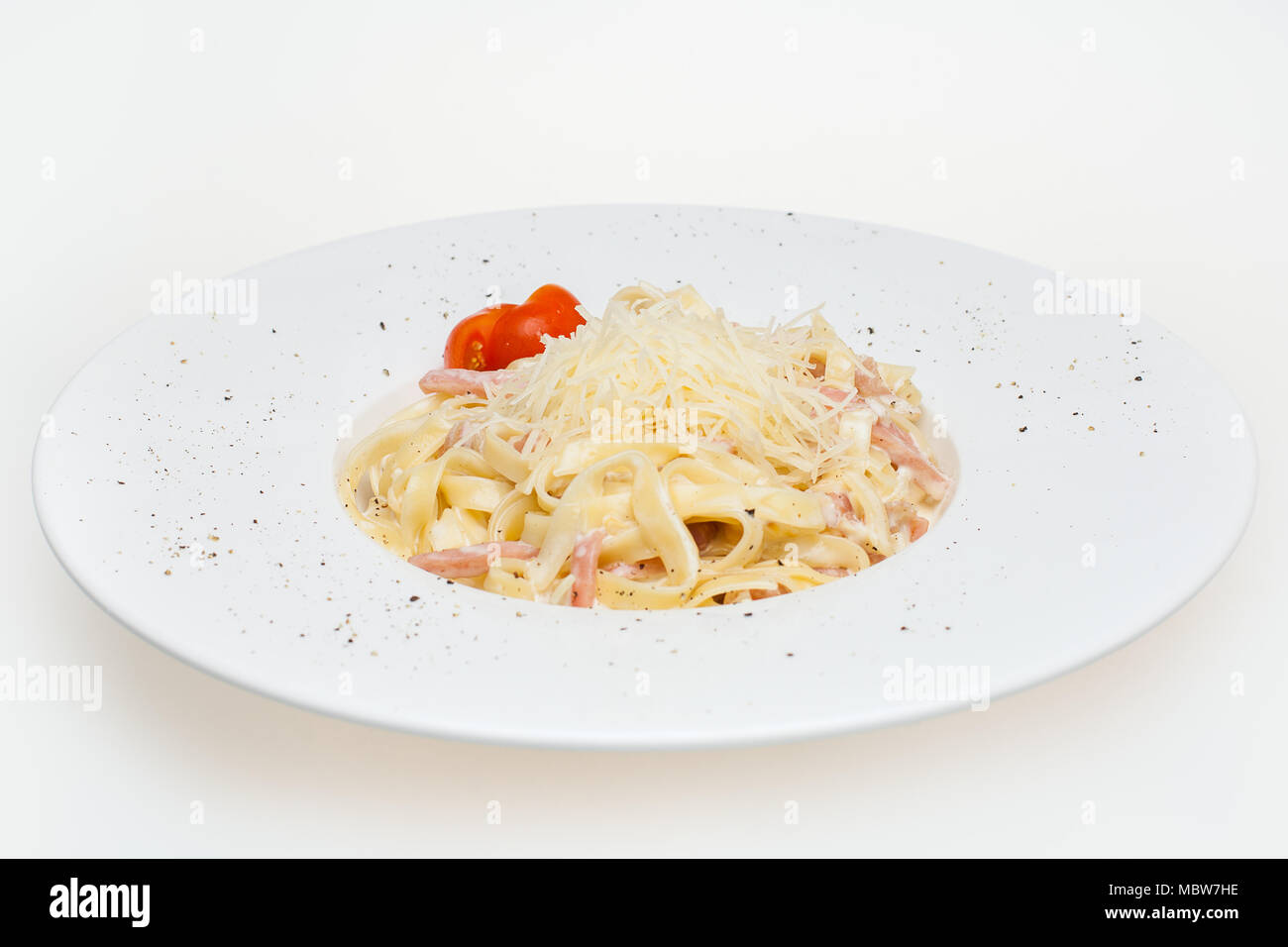 Pasta carbonara. Tagliatelli with becon, cheese and sauce, Italian food Stock Photo