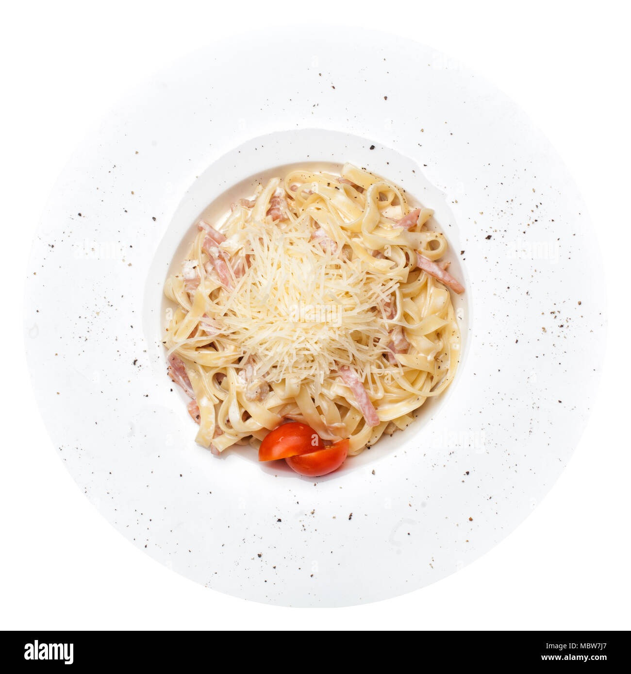 Pasta carbonara isolated. Tagliatelli with becon, cheese and sauce, Italian food Stock Photo