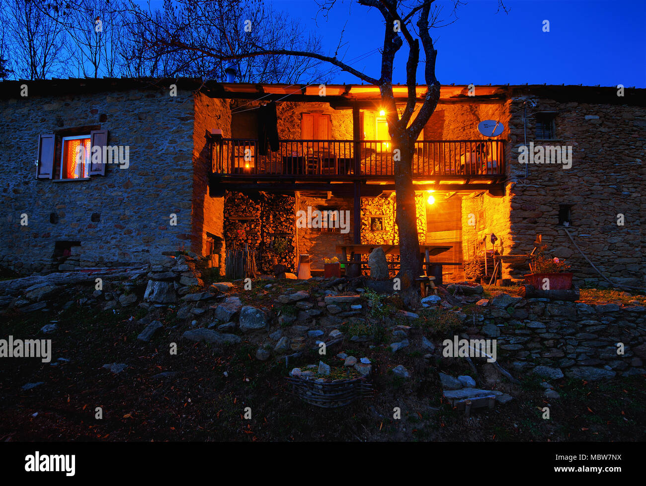 Old stone mountain house. The last old house of the hamlet that is still inhabited. Borgo di Mindino, Garessio, Italy. Stock Photo