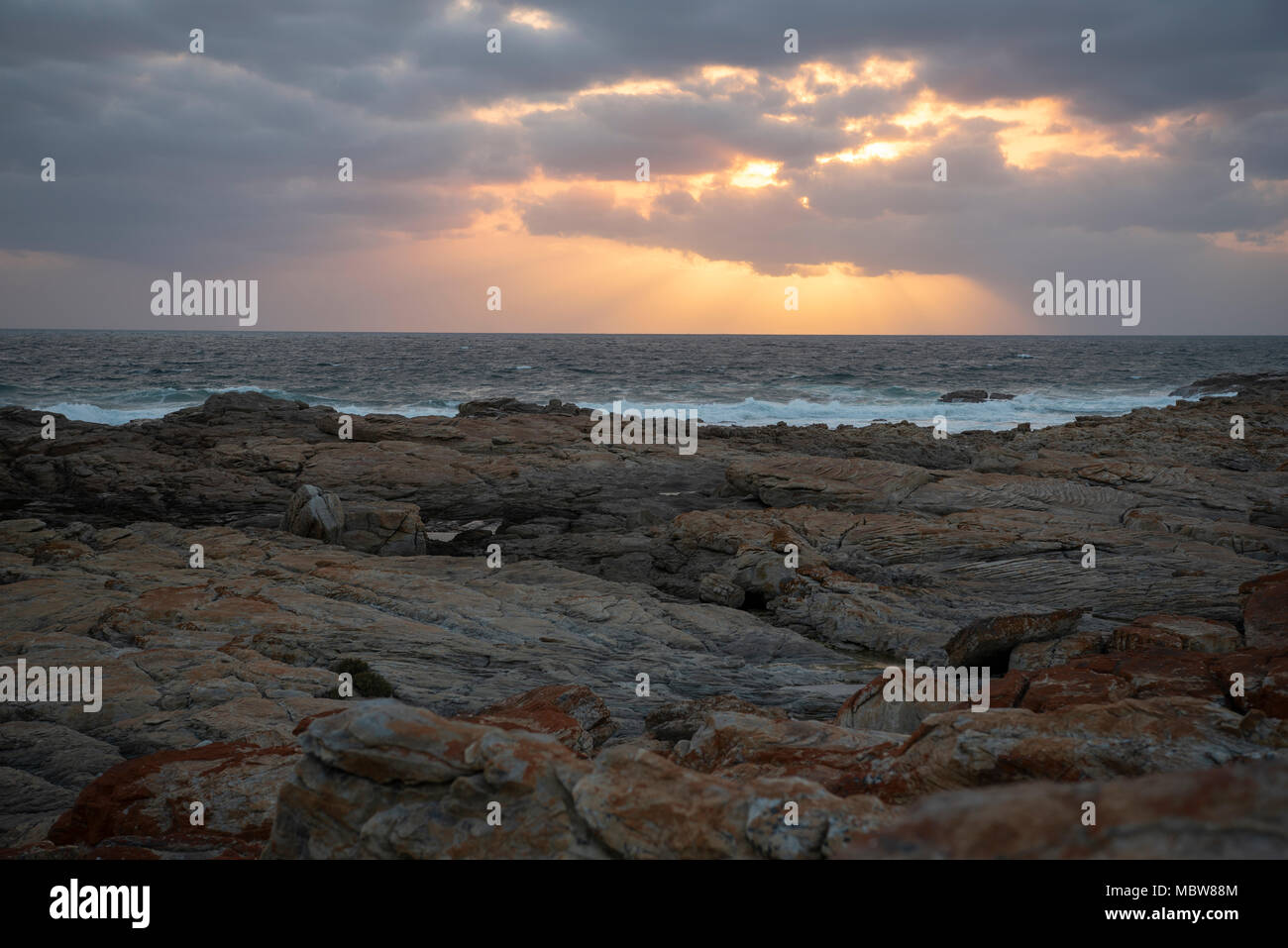 Scenic landscape of a beautiful sunset over the sea Stock Photo - Alamy