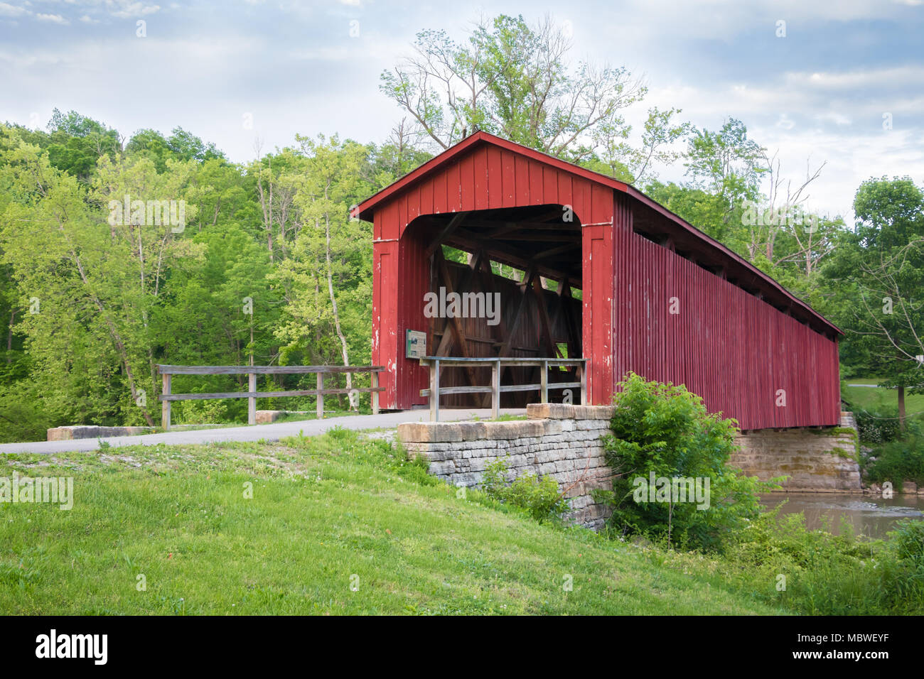 Covered Bridge over Mill Creek at Cataract Falls in Owen County Indiana Stock Photo