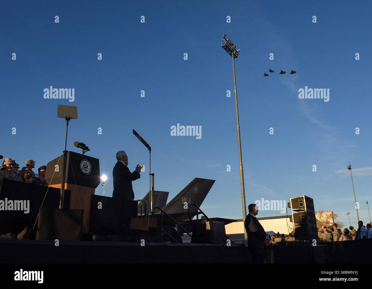 Vice President Mike Pence applauds as two F35 Lightning II fighter