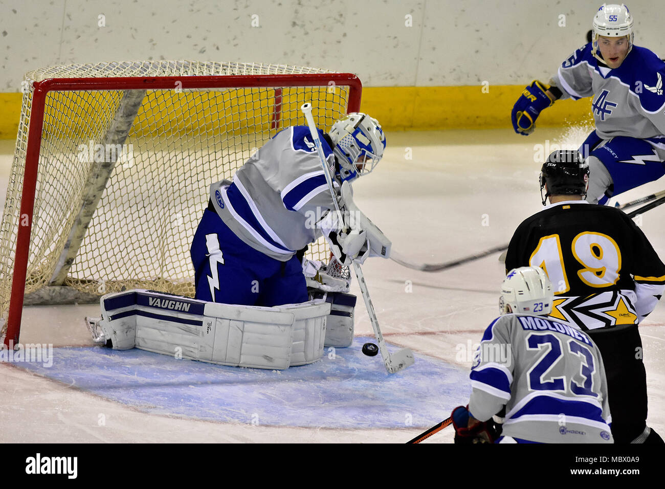 Air Force goalie Stanislav Barilov of Magadan, Russia, snags an Army