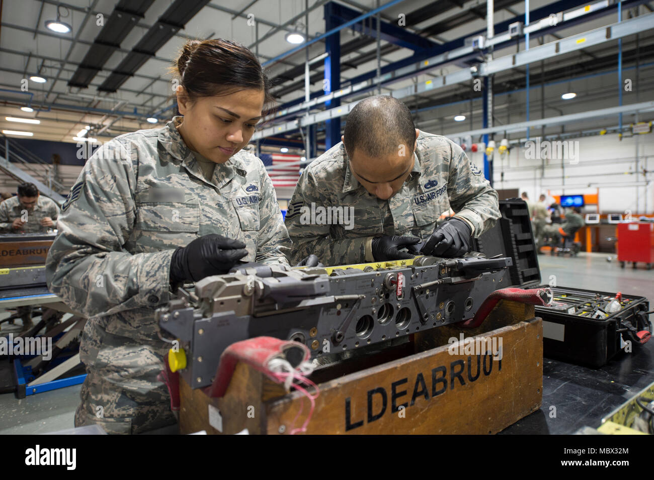 airmen-assigned-to-the-48th-munitions-squadron-aircraft-armament-systems-unit-inspect-aircraft-components-at-royal-air-force-lakenheath-england-jan-11-the-armament-flight-airmen-disassemble-repair-and-replace-mechanical-and