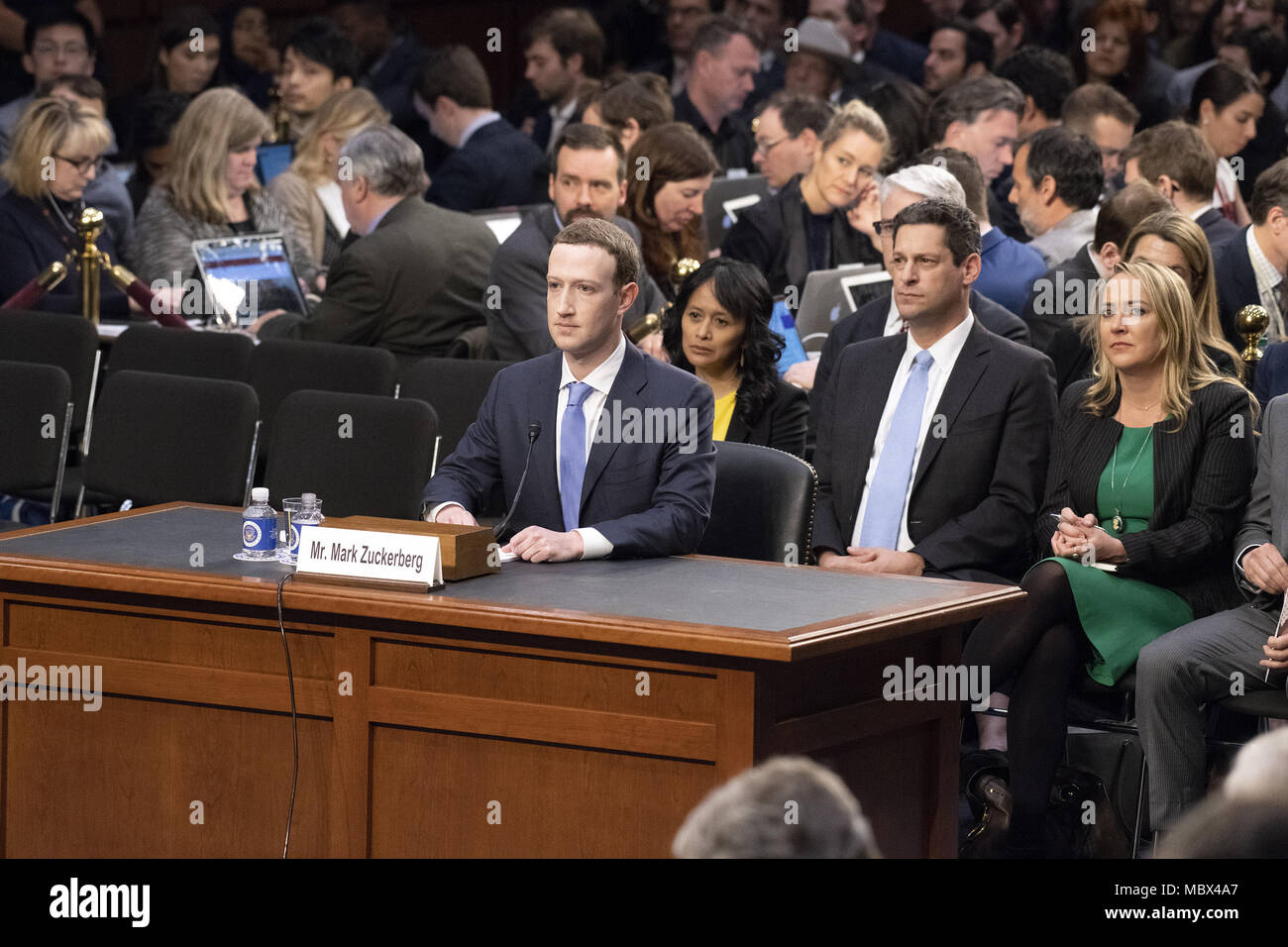 Washington, District of Columbia, USA. 10th Apr, 2018. Mark Zuckerberg, Co-Founder and CEO of Facebook, testifies before a joint meeting of the United States Senate Committee on the Judiciary and the US Senate Committee on Commerce, Science, and Transportation during a hearing to examine Facebook, as it relates to social media privacy and the use and abuse of data, on Capitol Hill in Washington, DC on Tuesday, April 10, 2018.Credit: Ron Sachs/CNP. Credit: Ron Sachs/CNP/ZUMA Wire/Alamy Live News Stock Photo