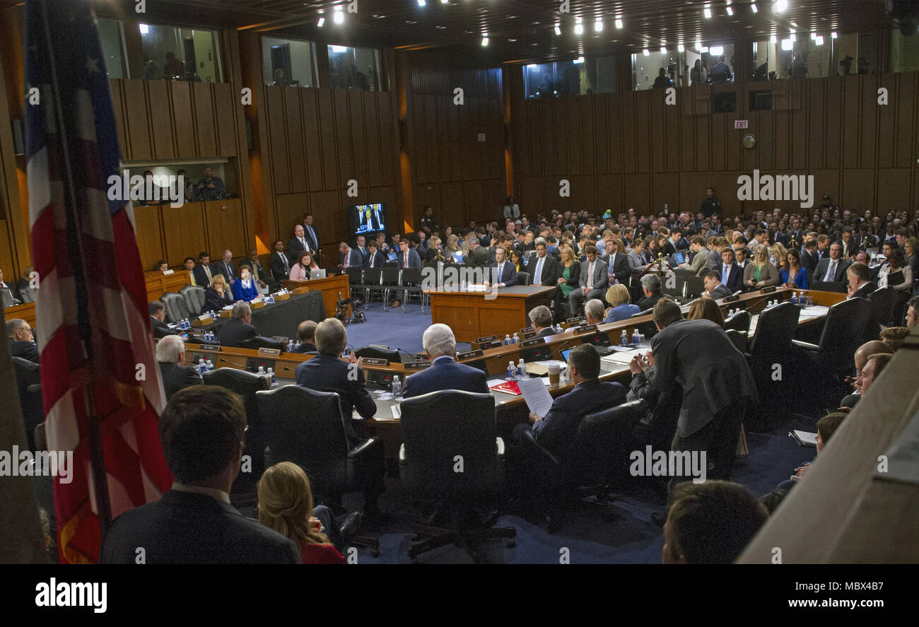 Washington, District of Columbia, USA. 10th Apr, 2018. Mark Zuckerberg, Co-Founder and CEO of Facebook, testifies before a joint meeting of the United States Senate Committee on the Judiciary and the US Senate Committee on Commerce, Science, and Transportation during a hearing to examine Facebook, as it relates to social media privacy and the use and abuse of data, on Capitol Hill in Washington, DC on Tuesday, April 10, 2018.Credit: Ron Sachs/CNP. Credit: Ron Sachs/CNP/ZUMA Wire/Alamy Live News Stock Photo