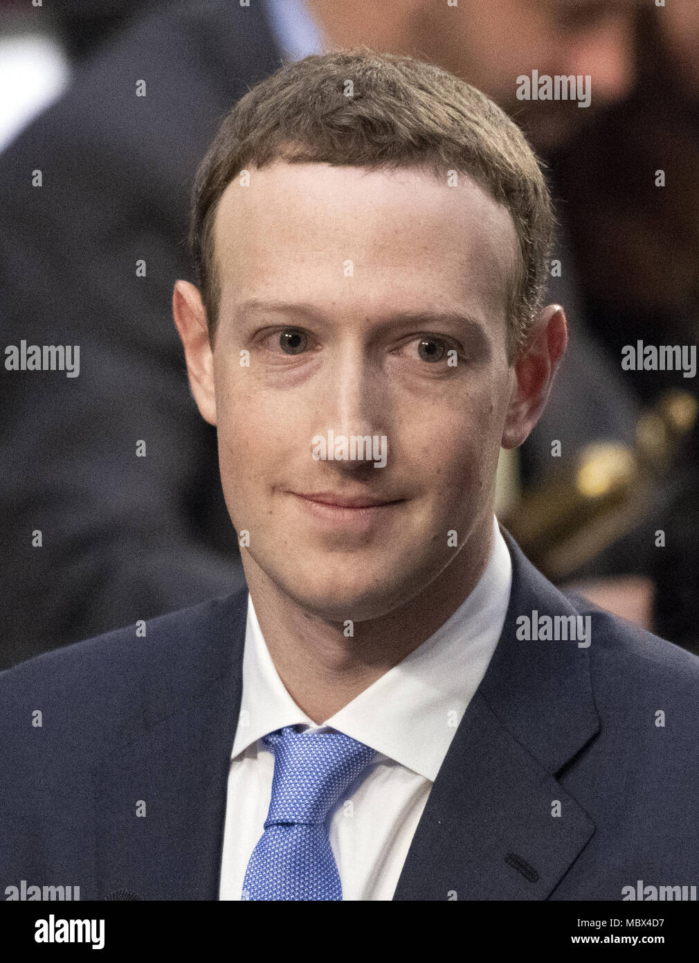 Washington, District of Columbia, USA. 10th Apr, 2018. Mark Zuckerberg, Co-Founder and CEO of Facebook, testifies before a joint meeting of the United States Senate Committee on the Judiciary and the US Senate Committee on Commerce, Science, and Transportation during a hearing to examine Facebook, as it relates to social media privacy and the use and abuse of data, on Capitol Hill in Washington, DC on Tuesday, April 10, 2018.Credit: Ron Sachs/CNP. Credit: Ron Sachs/CNP/ZUMA Wire/Alamy Live News Stock Photo