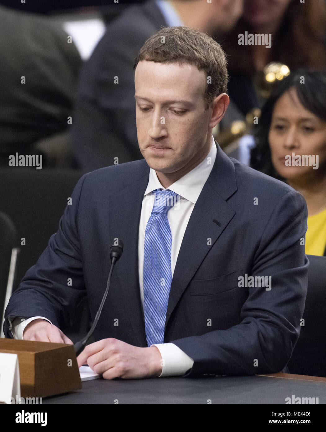 Washington, District of Columbia, USA. 10th Apr, 2018. Mark Zuckerberg, Co-Founder and CEO of Facebook, testifies before a joint meeting of the United States Senate Committee on the Judiciary and the US Senate Committee on Commerce, Science, and Transportation during a hearing to examine Facebook, as it relates to social media privacy and the use and abuse of data, on Capitol Hill in Washington, DC on Tuesday, April 10, 2018.Credit: Ron Sachs/CNP. Credit: Ron Sachs/CNP/ZUMA Wire/Alamy Live News Stock Photo