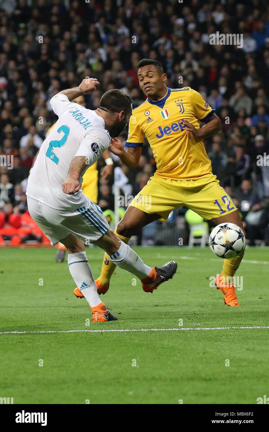 Madrid, Spain. 11th Apr, 2018. Real Madrid's Dani Carvajal (L) vies with Juventus' Alex Sandro during the UEFA Champions League quarterfinal second leg soccer match between Spanish team Real Madrid and Italian team Juventus in Madrid, Spain, on April 11, 2018. Juventus won 3-1. Real Madrid advanced to the semifinal with 4-3 on aggregate. Credit: Edward Peters Lopez/Xinhua/Alamy Live News Stock Photo