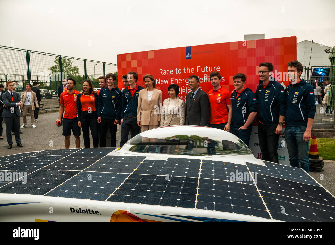 Shanghai, China. 12th April, 2018. Mrs Stientje van Velhoven State Secretary of Infrastructure and Water Management Kingdom of the Netherlands and Ms Lu Zufang Vice President, Jiading District with members of the Nuon Solar Team from the Netherlands at the Race to the Future, New Energy Vehicles event in Shanghai held at the autonomous vehicle testing ground in Anting, Shanghai. Credit: Mark Andrews/Alamy Live News Stock Photo