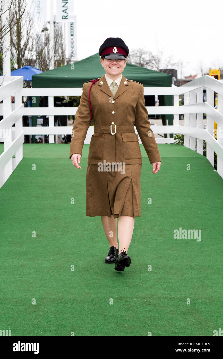 British army female soldier; Smart Cheryl Hill of the Queens Own Regiment  at the most famous event in the horse racing calendar welcomes people on  this very special parade of Ladies outfits