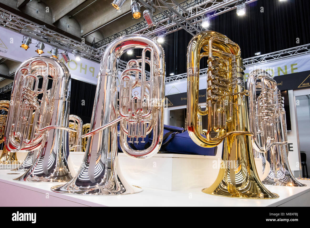 Frankfurt/Main, Germany. 11th April, 2018. Tubas of manufacturer Miraphone, Musikmesse Frankfurt, trade fair for musical instruments, sheet music, music production and marketing. Credit: Christian Lademann Stock Photo
