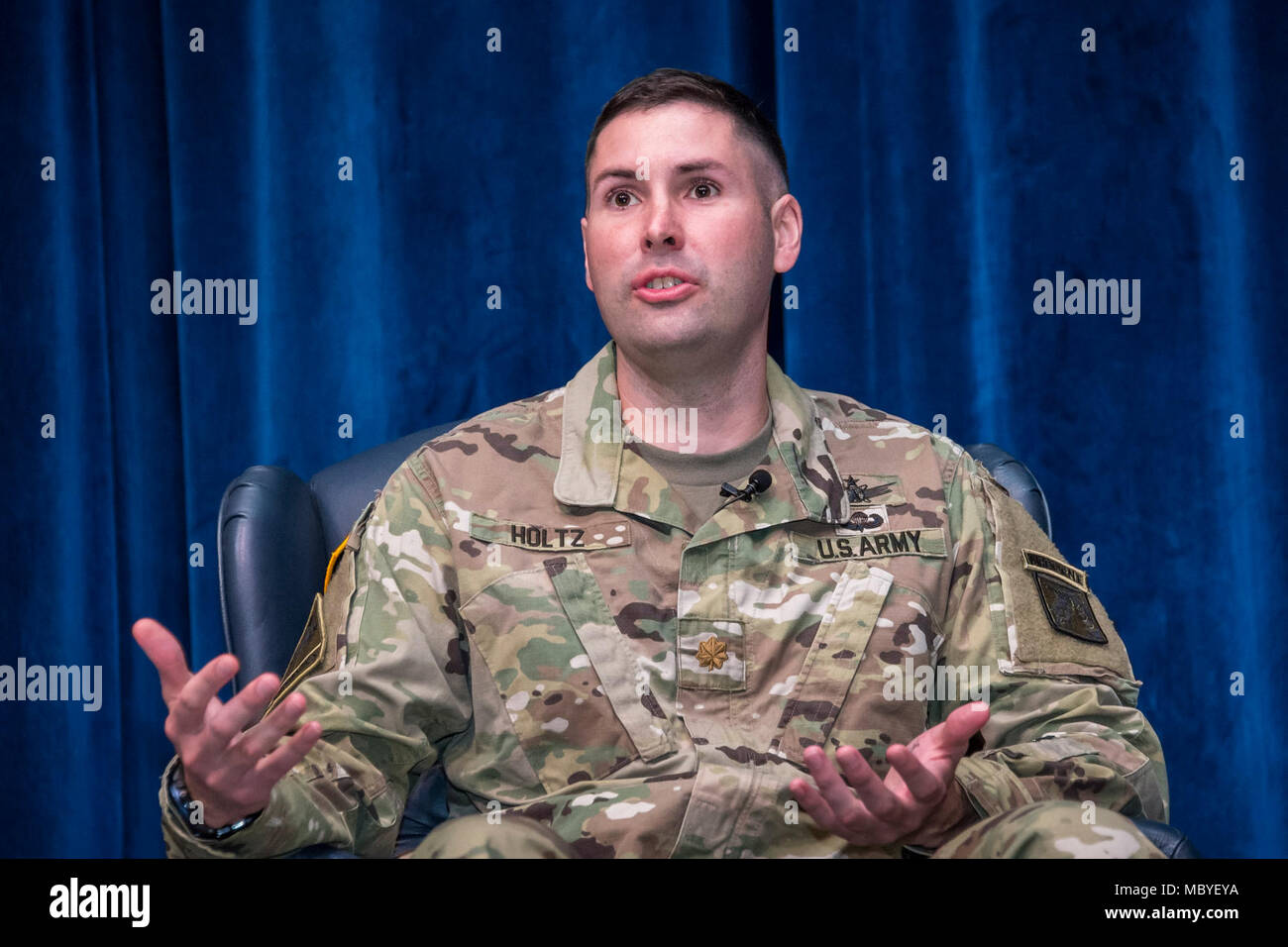 Maxwell AFB, Ala. US Army Major Nicholas Holtz, addresses members of