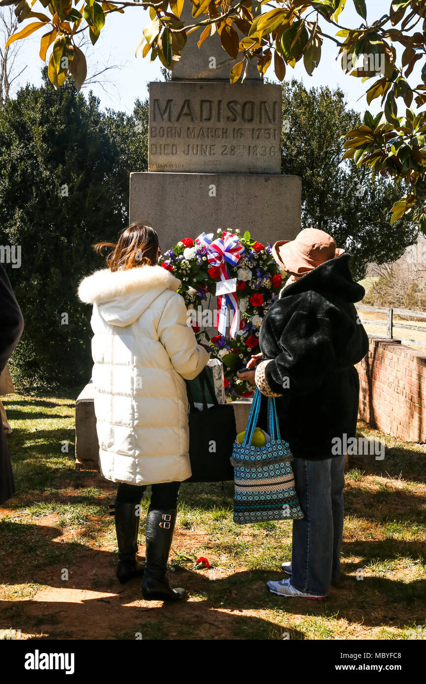 Guests view the Presidential wreath at the tomb of the 4th President of the United States, James Madison, also known as the Father of the Constitution, at his home at Montpelier, Orange, Va., March 16, 2018. The wreath laying ceremony was held in commemoration of the 267th anniversary of the birth of Madison, born in 1751, and has also been decreed as James Madison Appreciation Day for the Commonwealth of Virginia. Stock Photo