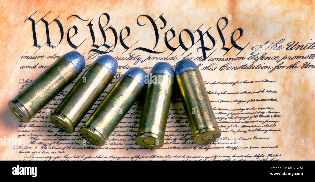We the people with five brass bullets. Stock Photo