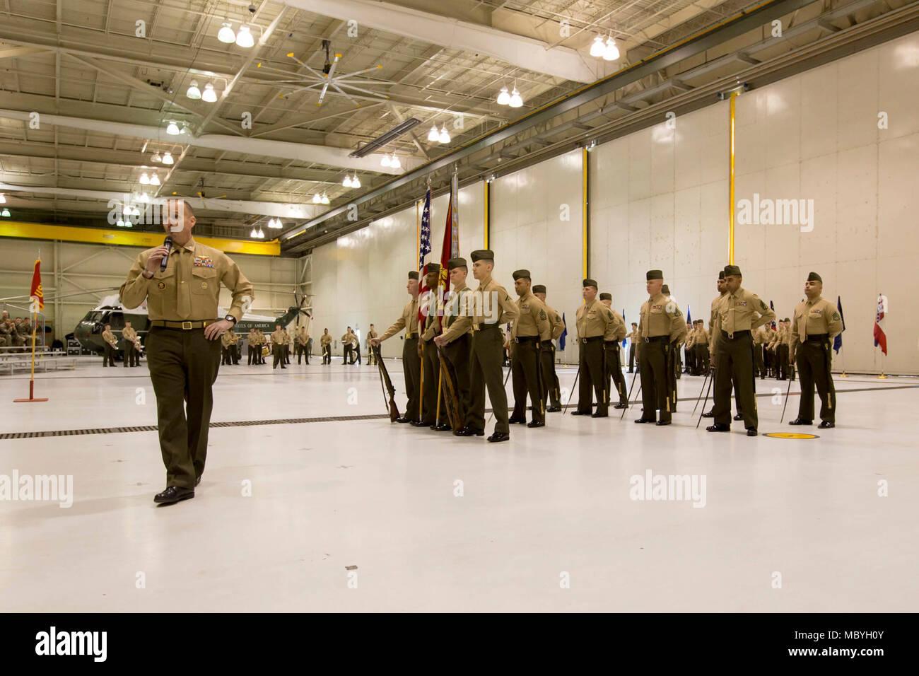 U.S. Marine Corps Col. Garrett Hoffman, commanding officer, Marine Helicopter Squadron One (HMX-1), speaks during a relief and appointment ceremony at HMX-1, Marine Corps Base Quantico, Va., March 23, 2018. Sgt. Maj. Devon Lee, outgoing sergeant major, relinquished command to Sgt. Maj. Sean Cox. Stock Photo