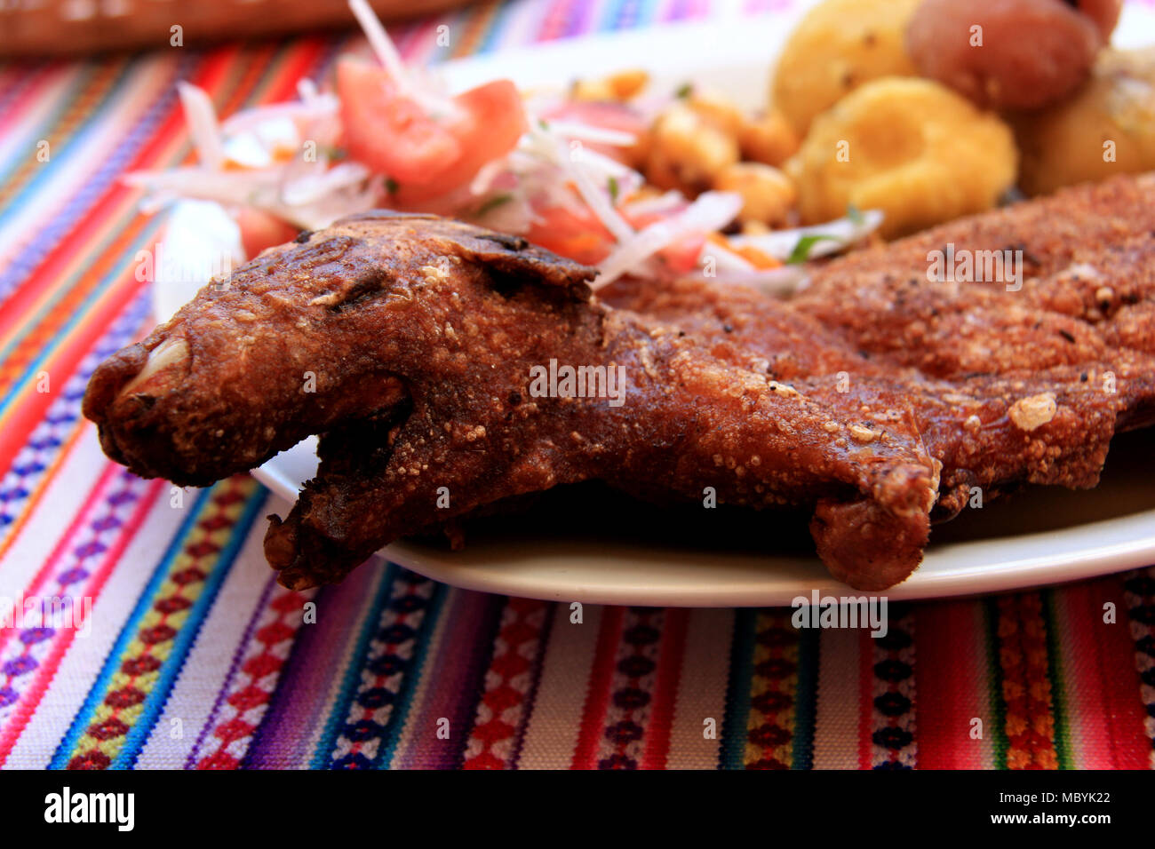 Fried Cuy (Guinea Pig) on a Plate in a Restaurant in Ollantaytambo, Peru Stock Photo
