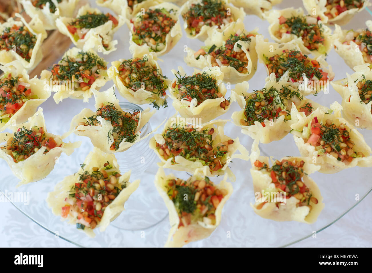 Catering of canape with cheese, vegatables and pinenuts, snacks on table Stock Photo