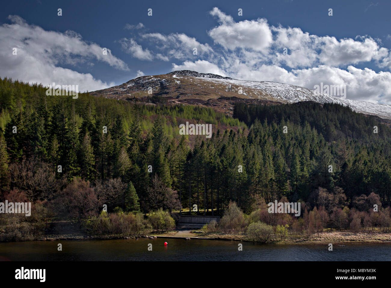Snow capped Moel Siabod mountain and Llyn Mymbyr in Snowdonia, North