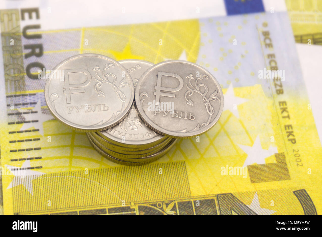 Euro money raise concept, arrow chart pointing up against background of Euro bills Stock Photo