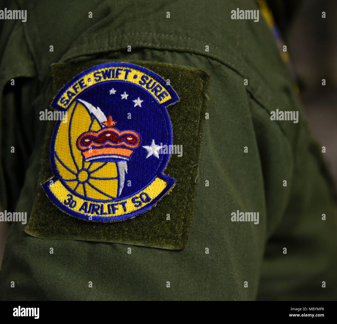 A 3rd Airlift Squadron unit patch is shown on the uniform of an Airman during the transport of the Parker Solar Probe on Joint Base Andrews, Md., April 3, 2018. The 3rd AS assigned to the 436th Airlift Wing at Dover Air Force Base, Del., transported the PSP in a C-17 Globemaster III to the Space Coast Regional Airport in Titusville, Fla. Stock Photo