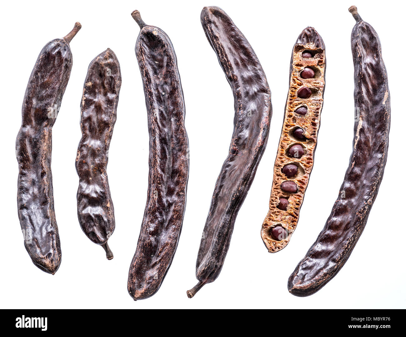 Carob pods on the white background Stock Photo Alamy