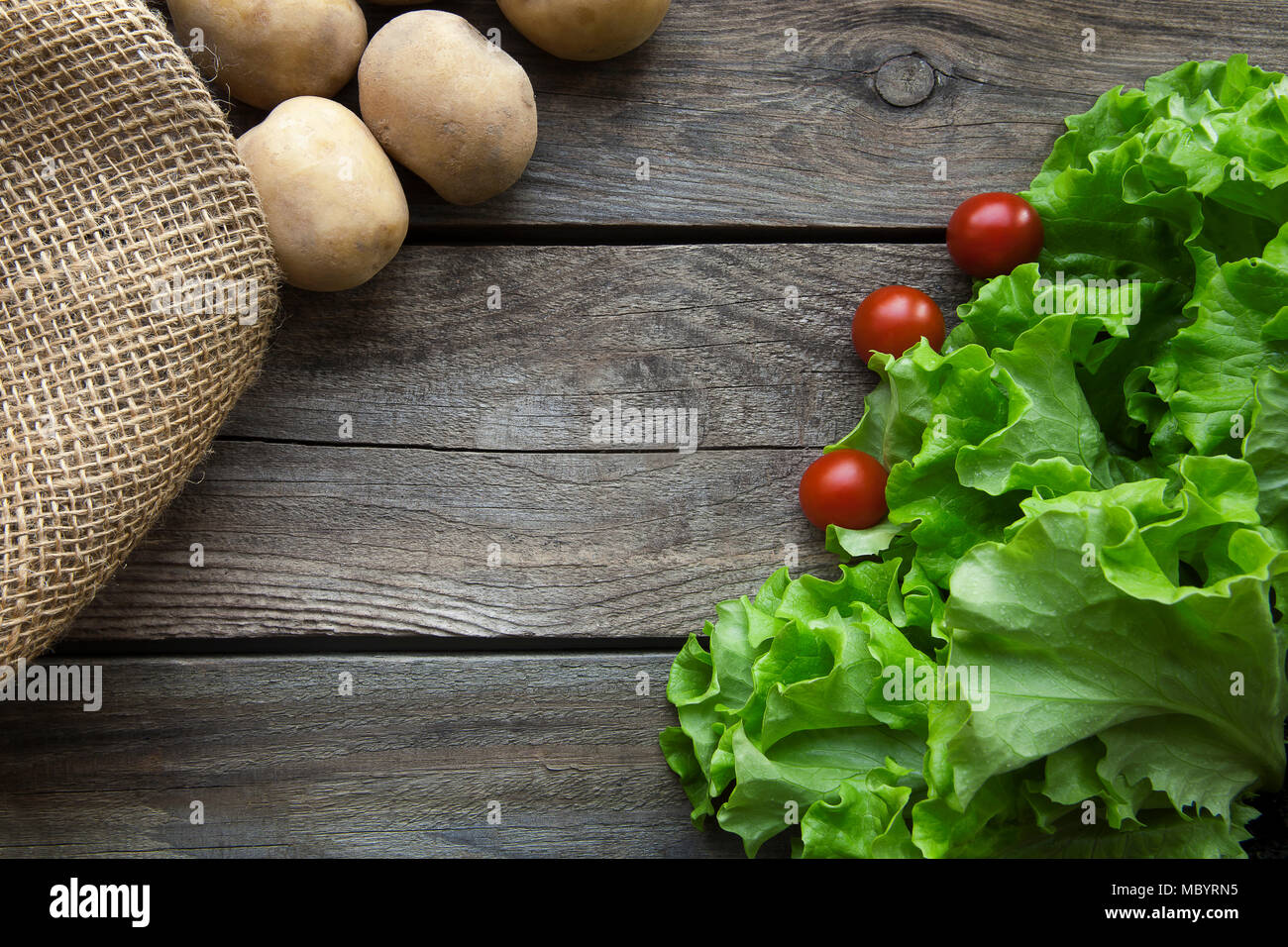 Fresh garden herbs on wooden table. Top view with copy space Stock Photo