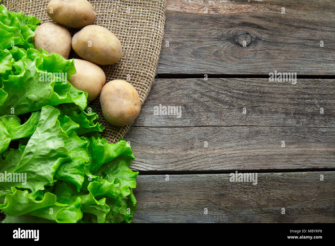Fresh garden herbs on wooden table. Top view with copy space Stock Photo