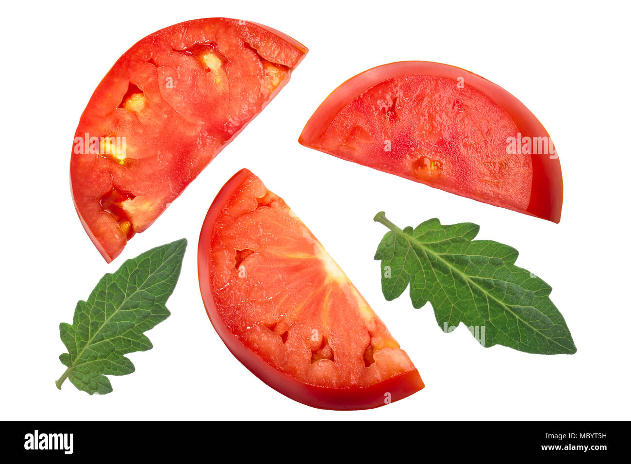 Slices of fleshy beef tomato (halved rings), top view Stock Photo