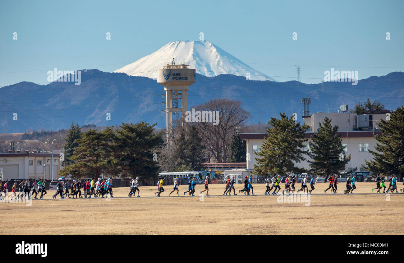 Competitors run around the Yokota Air Base, Japan, Jan. 14, 2018, during  the 37th Annual Yokota Striders Frostbite Race. Team Yokota hosted about  12,000 participants for the event. (U.S. Air Force photo