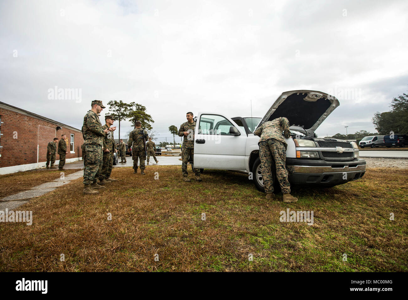 U.S. Marines and with Battalion Landing Team, 2nd Battalion, 6th Marine Regiment, 26th Marine Expeditionary Unit (MEU), participate in vehicle-borne improvised explosive device (VBIED) training on Camp Lejeune, N.C., Jan. 11, 2018. The two-day course was held to educate Marines on the proper procedures of inspecting vehicles and civilians for potential threats while also giving them the opportunity to practice techniques in preparation for the upcoming deployment. (U.S. Marine Corps photo by Lance Cpl. Tojyea G. Matally) Stock Photo