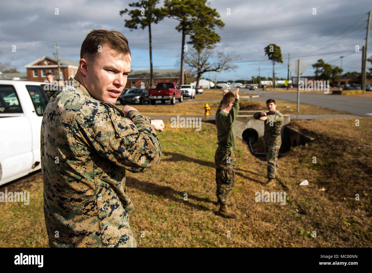 U.S. Marines with Battalion Landing Team, 2nd Battalion, 6th Marine Regiment, 26th Marine Expeditionary Unit (MEU), apprehend a simulated suspect during vehicle-borne improvised explosive device (VBIED) training on Camp Lejeune, N.C., Jan. 11, 2018. The two-day course was held to educate Marines on the proper procedures of inspecting vehicles and civilians for potential threats while also giving them the opportunity to practice techniques in preparation for the upcoming deployment. (U.S. Marine Corps photo by Lance Cpl. Tojyea G. Matally) Stock Photo