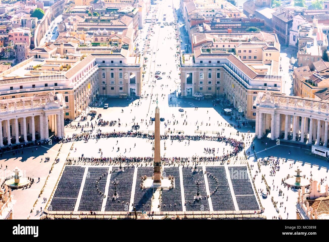 Long queue of visitors waiting to enter in St. Peter's basilica in Vatican. Stock Photo