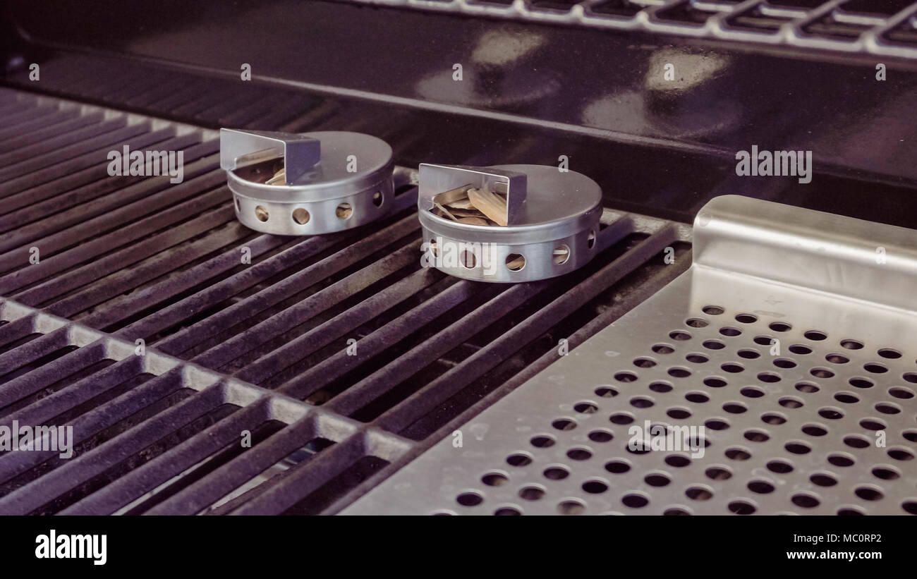 Preheating gas grill for summer evening cooking Stock Photo Alamy