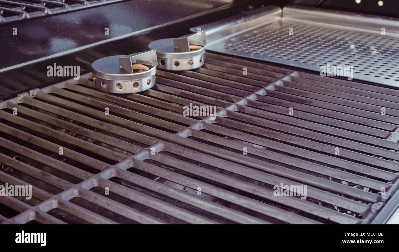 Preheating gas grill for summer evening cooking Stock Photo Alamy