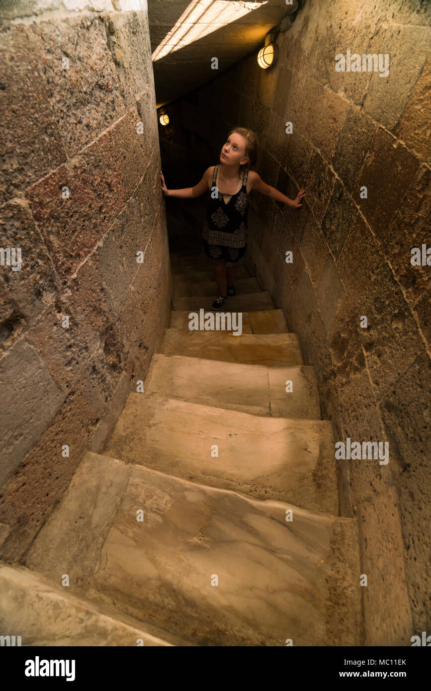 Teen girl walking up stairs hi-res stock photography and images - Alamy