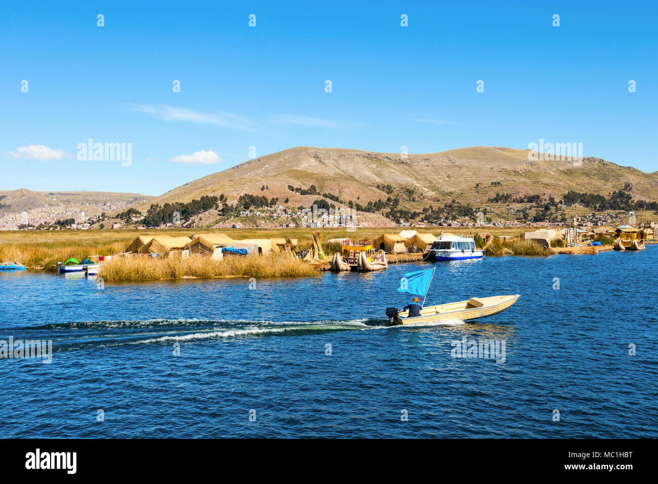 Titicaca is a large, deep lake in the Andes on the border of Peru and Bolivia Stock Photo
